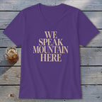Purple v-neck t-shirt with "WE SPEAK MOUNTAIN HERE" text