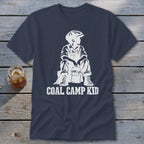 Navy t-shirt with white graphic of boy holding bucket, text "COAL CAMP KID".