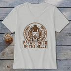 Light grey v-neck t-shirt with brown lantern graphic and "ESTABLISHED IN THE HILLS" text.