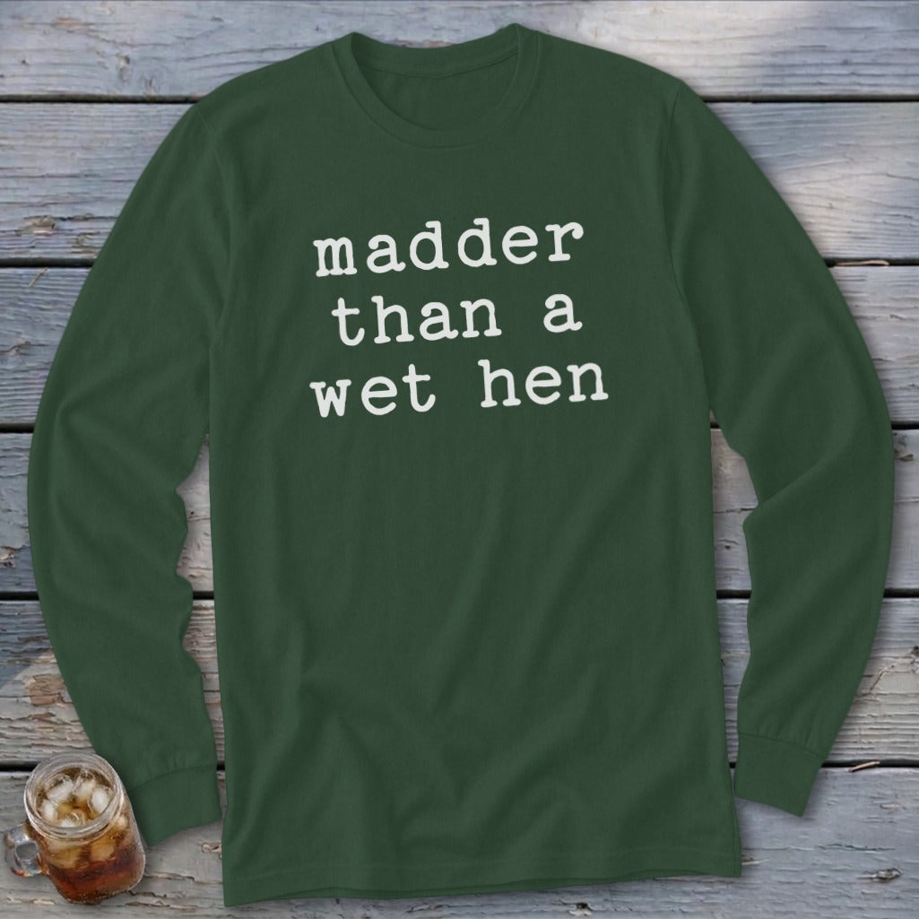 Dark green long sleeve shirt with white text that reads "madder than a wet hen".