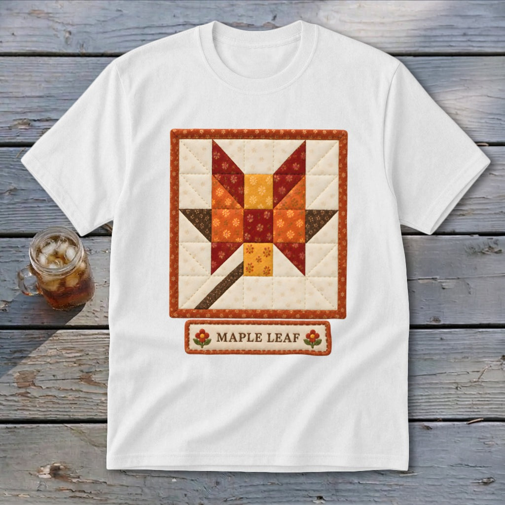 White t-shirt with a maple leaf quilt block design and "MAPLE LEAF" text.