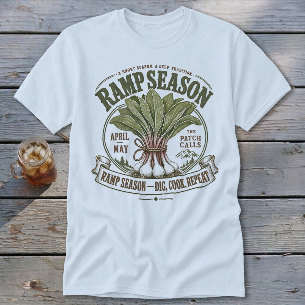 White t-shirt with "Ramp Season" graphic featuring a bundle of ramps and mountains.