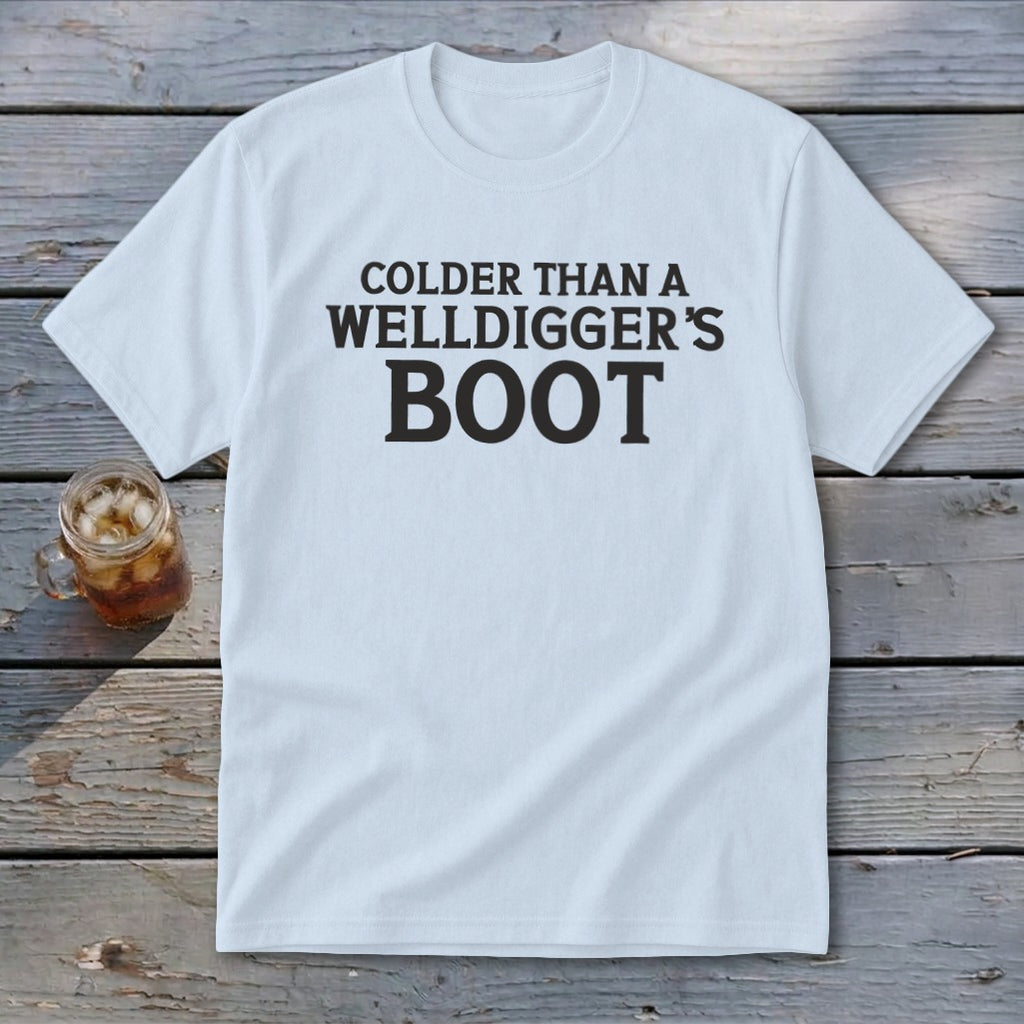 Light blue t-shirt with "Colder Than A Welldigger's Boot" printed in black.