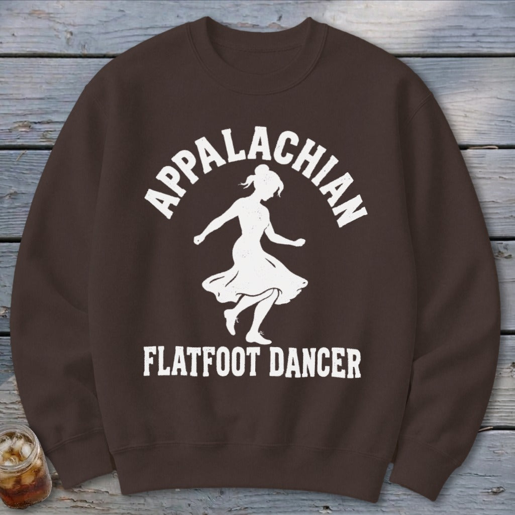 Brown crewneck sweatshirt featuring a white graphic of a dancer with Appalachian Flatfoot Dancer text.
