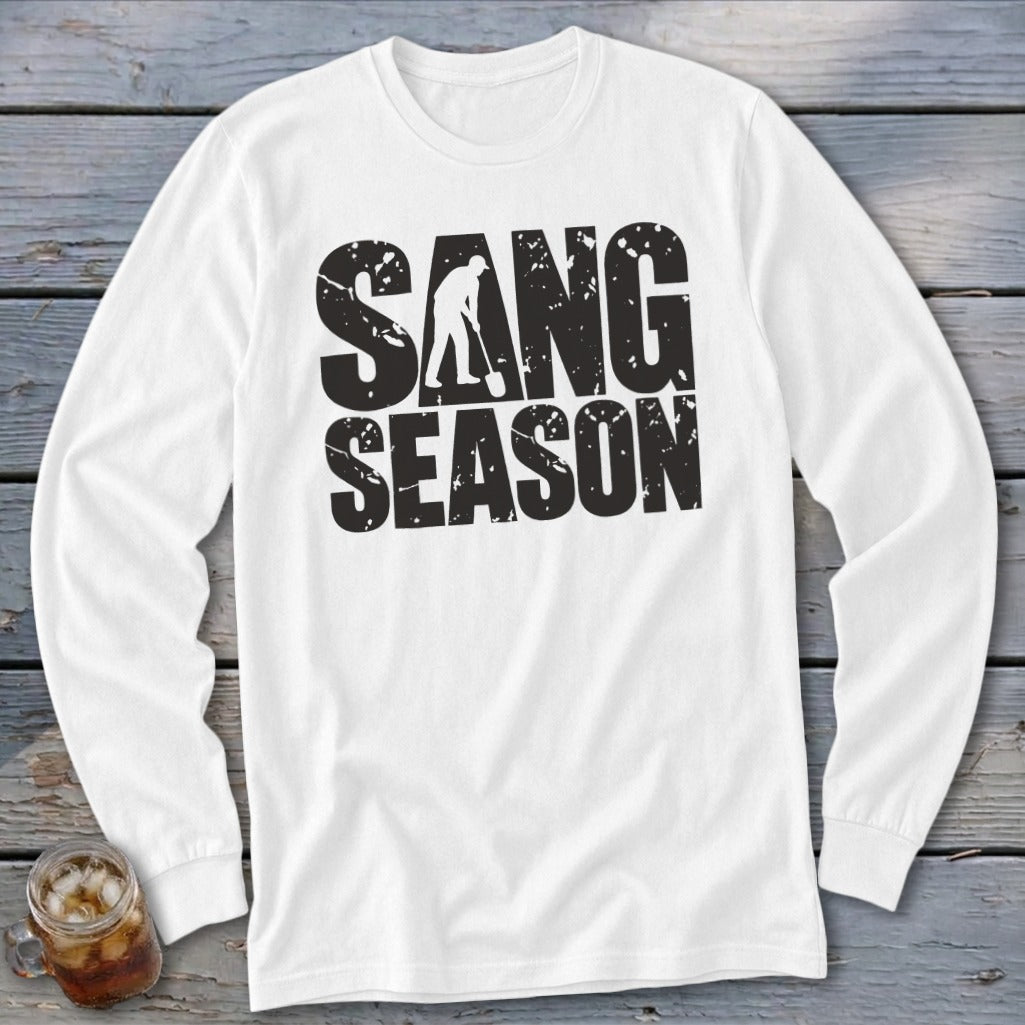 White long-sleeve t-shirt with black distressed text reading SANG SEASON and a graphic of a person digging.