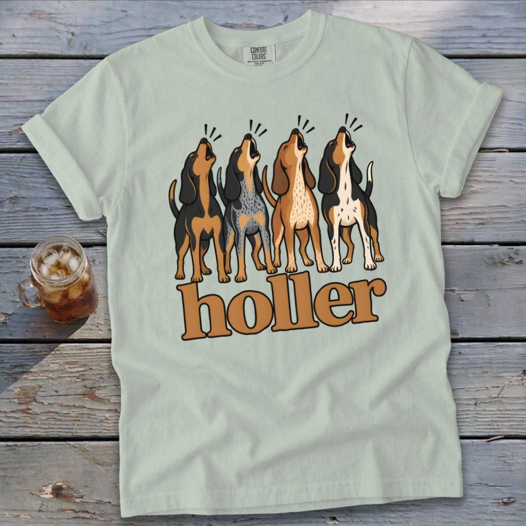 Light green t-shirt with four howling dogs and "holler" text.
