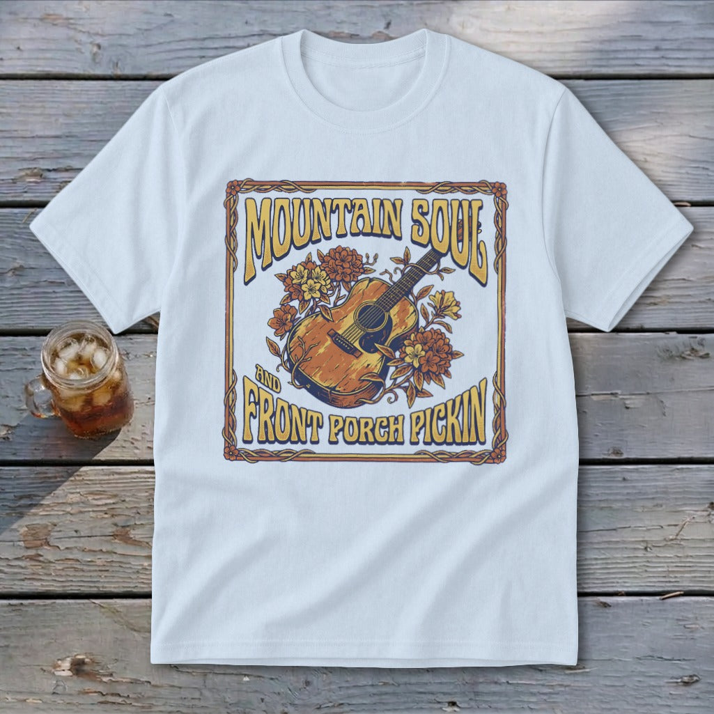 White t-shirt with "Mountain Soul and Front Porch Pickin" text and guitar graphic.
