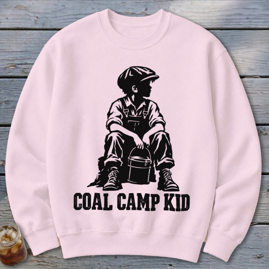 Pink sweatshirt with black graphic of a boy in overalls holding a bucket, text reads "COAL CAMP KID".