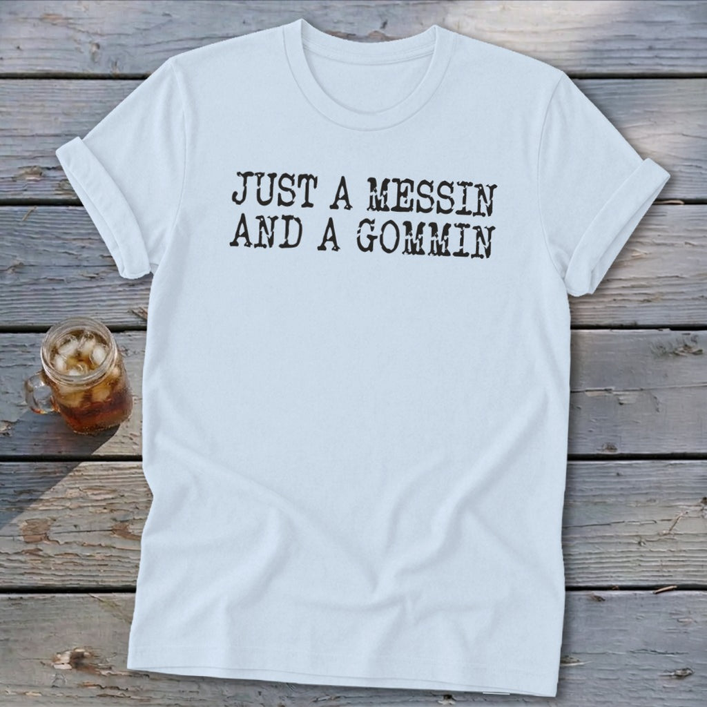 Light blue t-shirt with "JUST A MESSIN AND A GOMMIN" text.