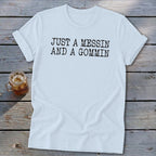 Light blue t-shirt with "JUST A MESSIN AND A GOMMIN" text.