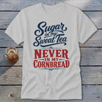 Light gray t-shirt with red and blue typography that reads Sugar in my Sweat Tea Never in my Cornbread.