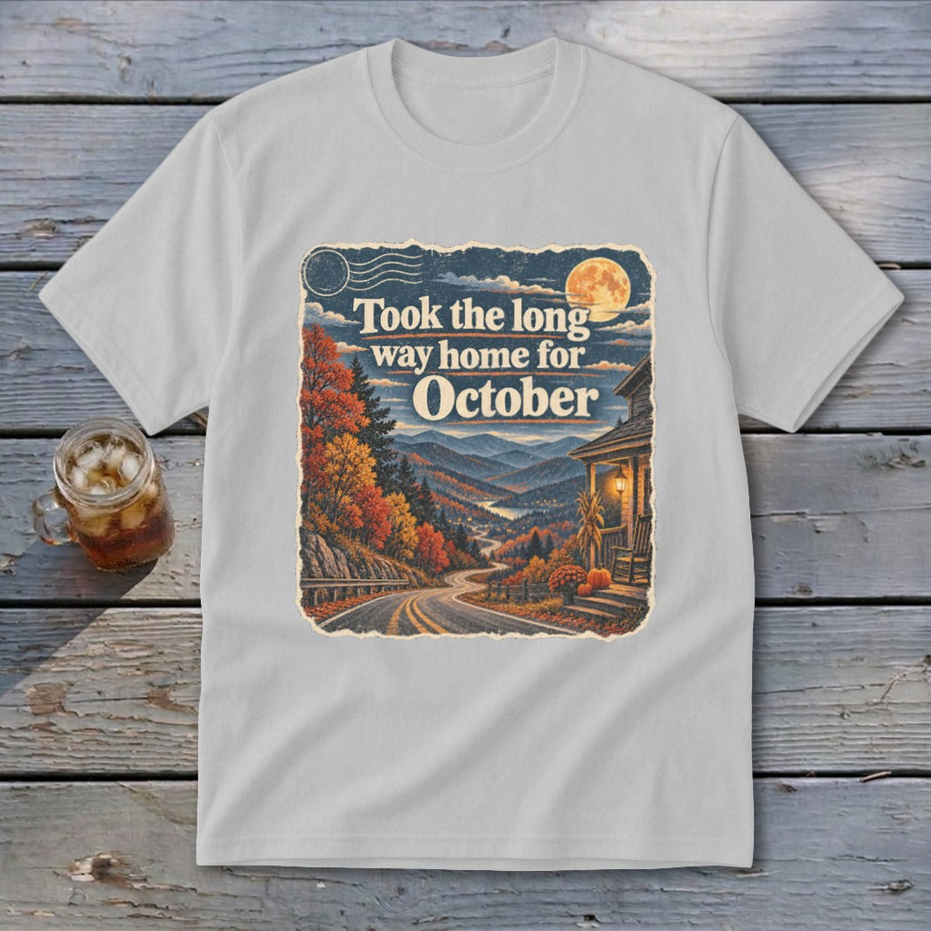 T-shirt with "Took the long way home for October" text and autumn mountain scene.