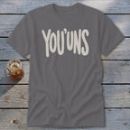 Grey t-shirt with "YOU'UNS" in cream, textured lettering.