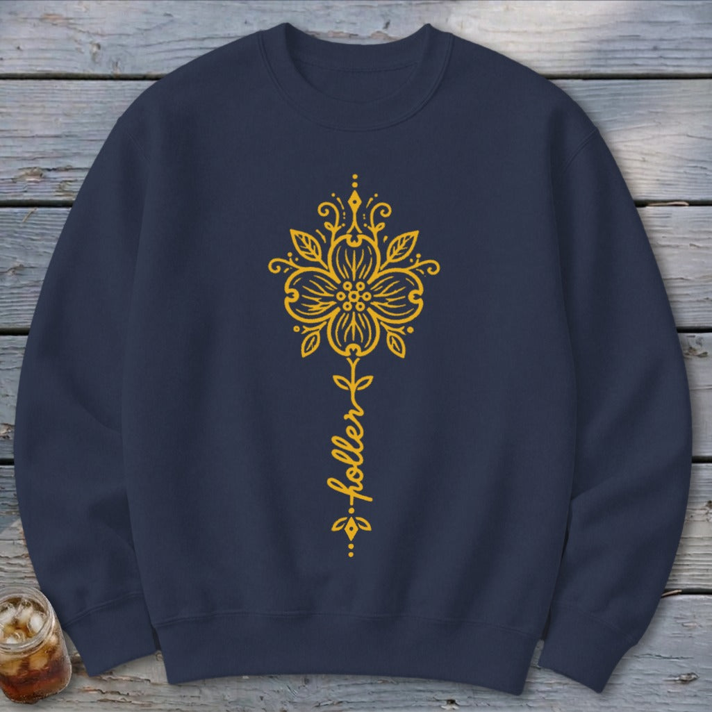 Navy blue sweatshirt with yellow floral design and "holler" text.