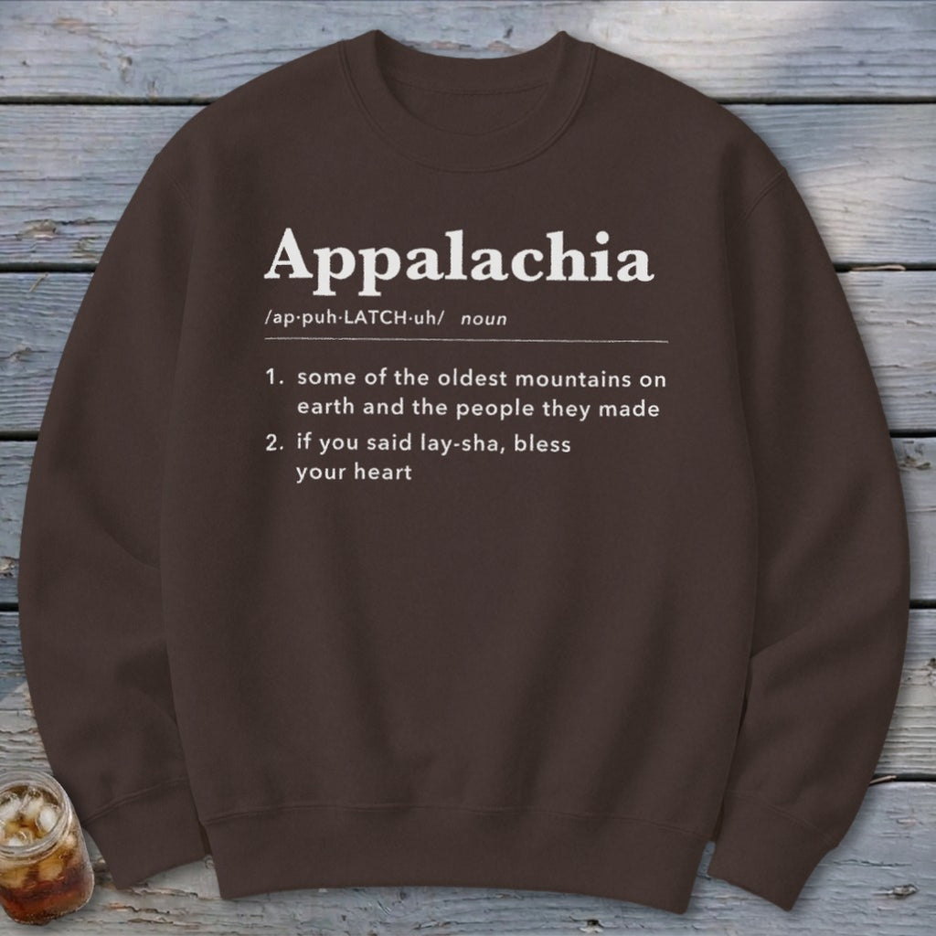 A brown crewneck sweatshirt featuring a dictionary-style definition of Appalachia printed in white text.