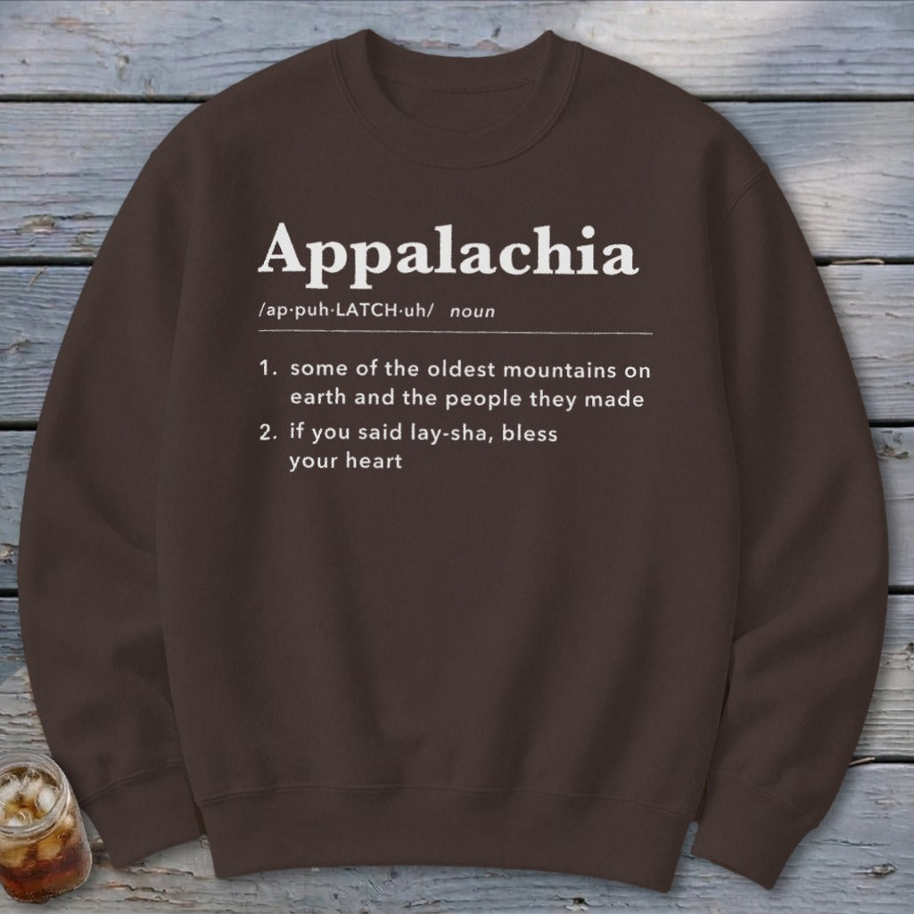 A brown crewneck sweatshirt featuring a dictionary-style definition of Appalachia printed in white text.