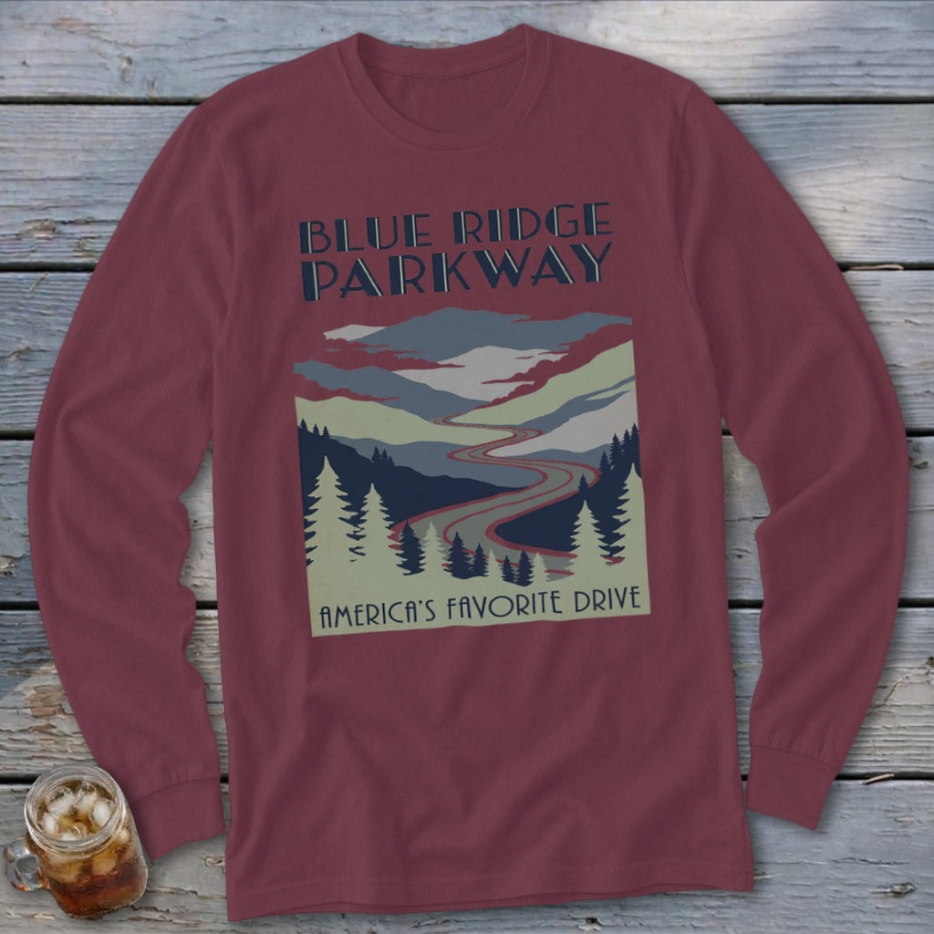 Maroon long-sleeve t-shirt featuring a Blue Ridge Parkway graphic with mountains, trees, and a winding road.