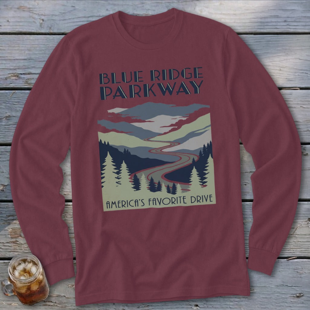 Maroon long-sleeve t-shirt featuring a Blue Ridge Parkway graphic with mountains, trees, and a winding road.
