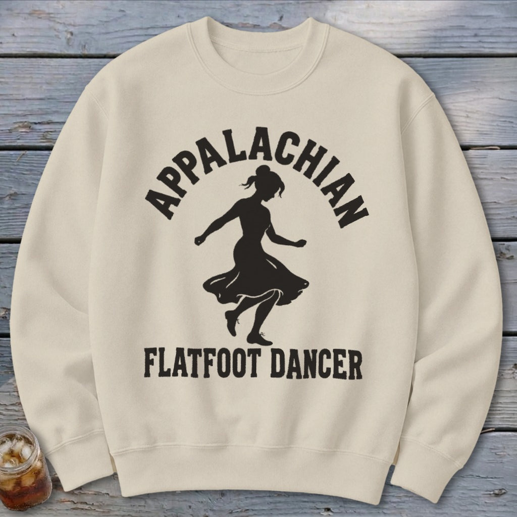 Beige crewneck sweatshirt featuring a black graphic of a dancing woman and text reading Appalachian Flatfoot Dancer.