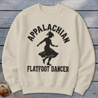 Beige crewneck sweatshirt featuring a black graphic of a dancing woman and text reading Appalachian Flatfoot Dancer.
