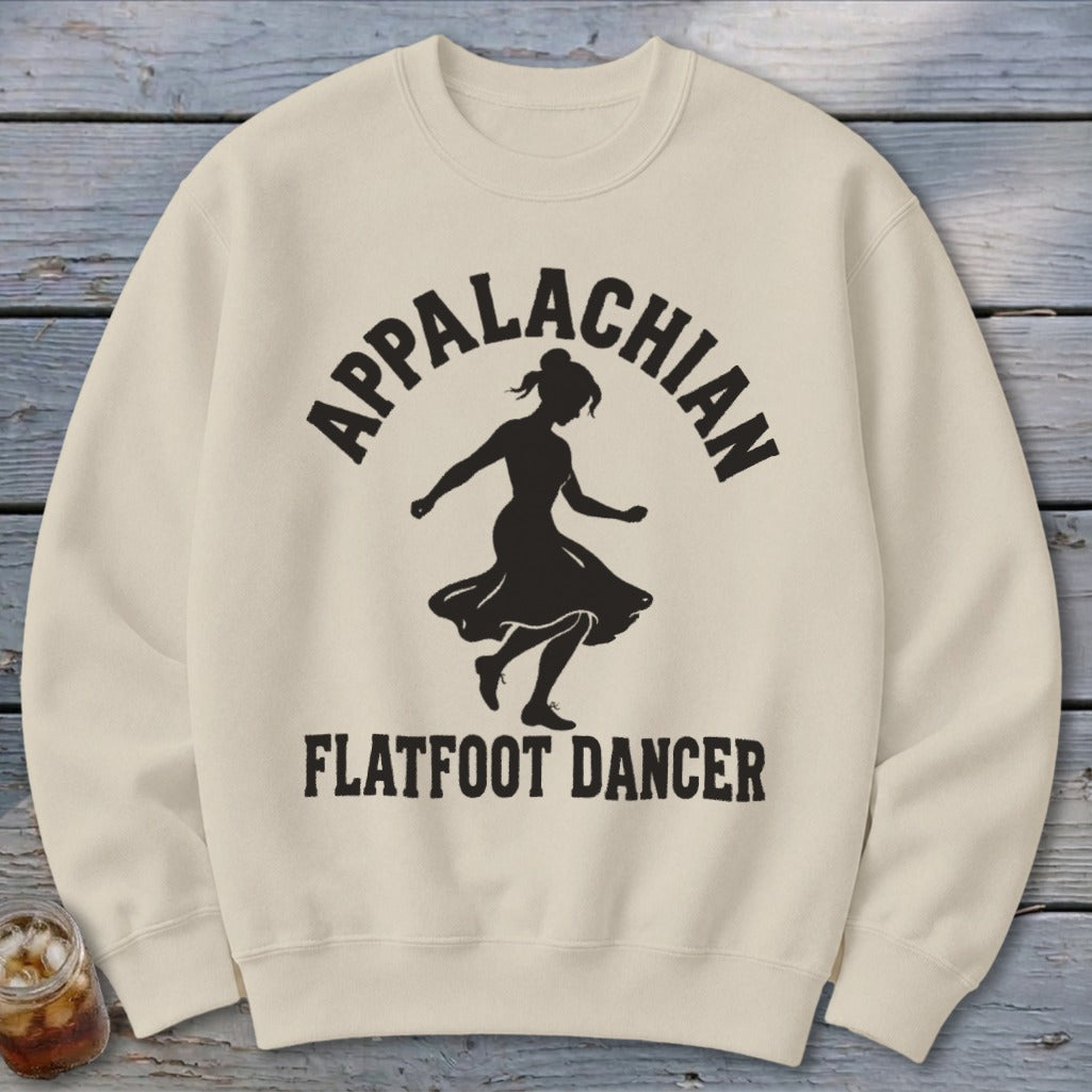 Beige crewneck sweatshirt featuring a black graphic of a dancing woman and text reading Appalachian Flatfoot Dancer.