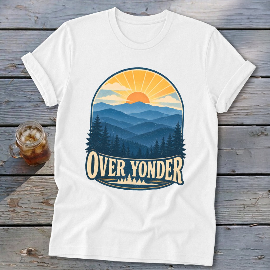 A white short-sleeved t-shirt featuring a retro graphic of mountains and the text "Over Yonder".