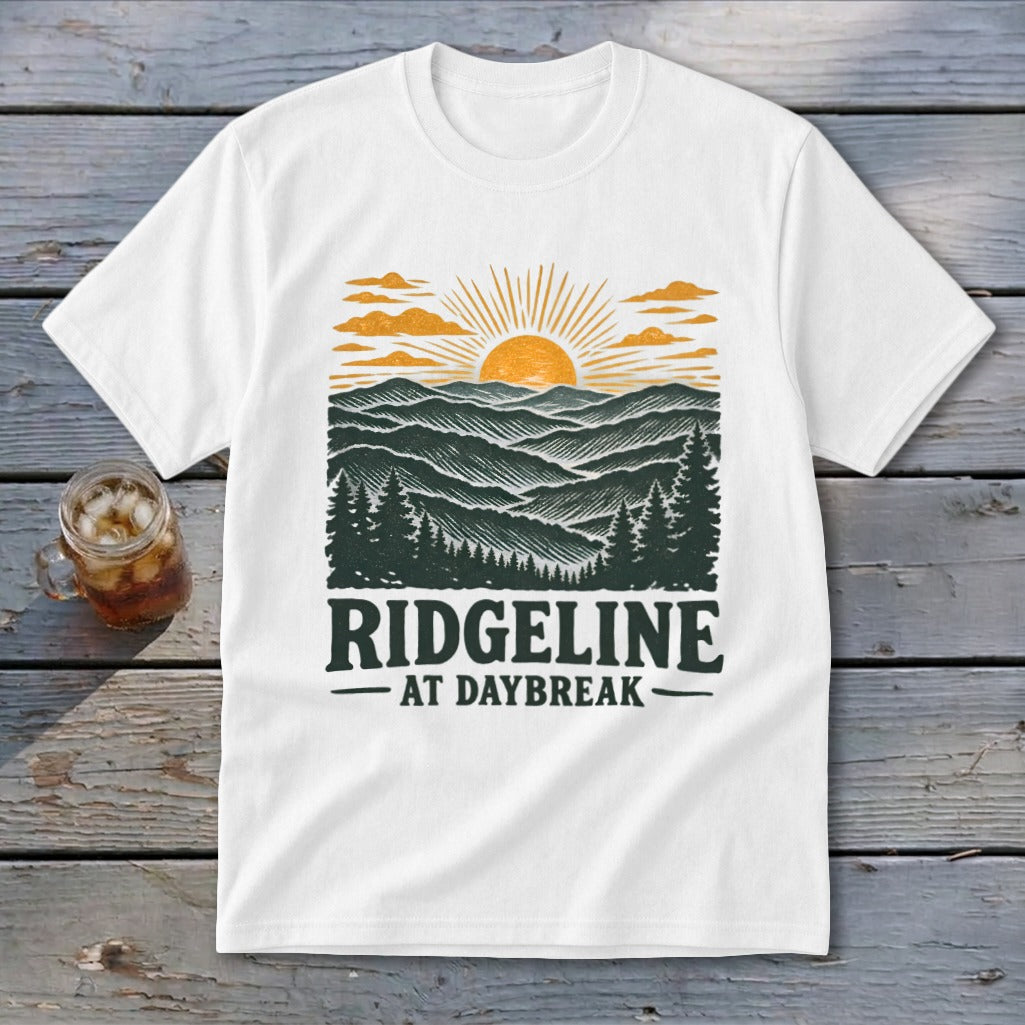 White t-shirt with a Ridgeline at Daybreak landscape graphic.
