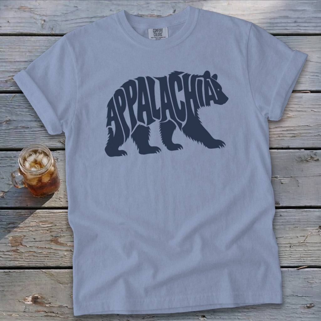A light blue crewneck t-shirt featuring a dark blue graphic of a walking bear filled with the text Appalachia.