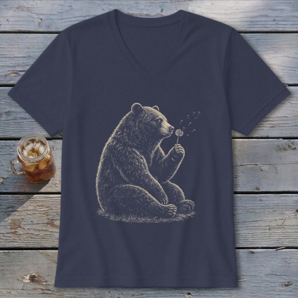 Bear blowing on a dandelion on a navy v-neck t-shirt.