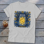 White t-shirt with a "Lightning Bugs" graphic featuring a mason jar full of fireflies.