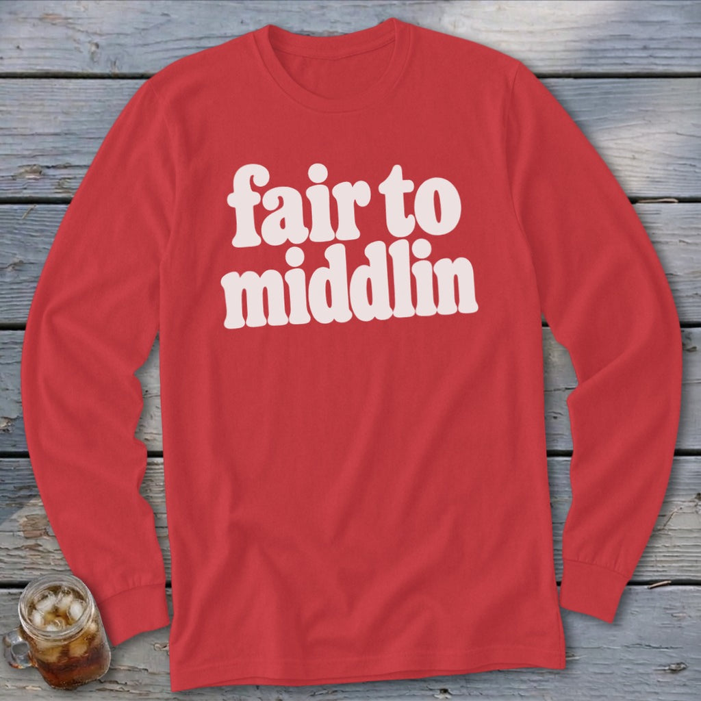 Red long-sleeve shirt with white text that says "fair to middlin".