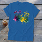 Blue t-shirt with watercolor floral design in purple and yellow.