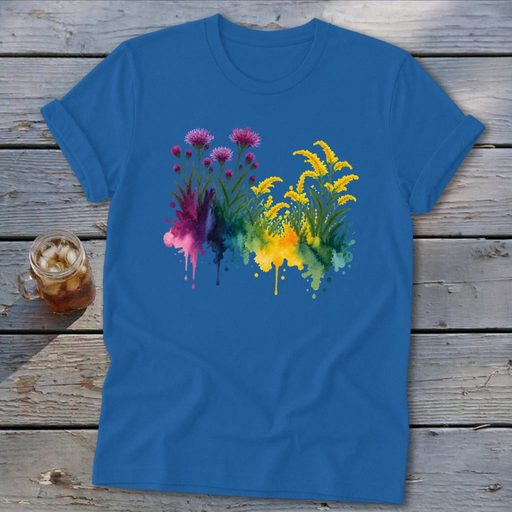 Blue t-shirt with watercolor floral design in purple and yellow.