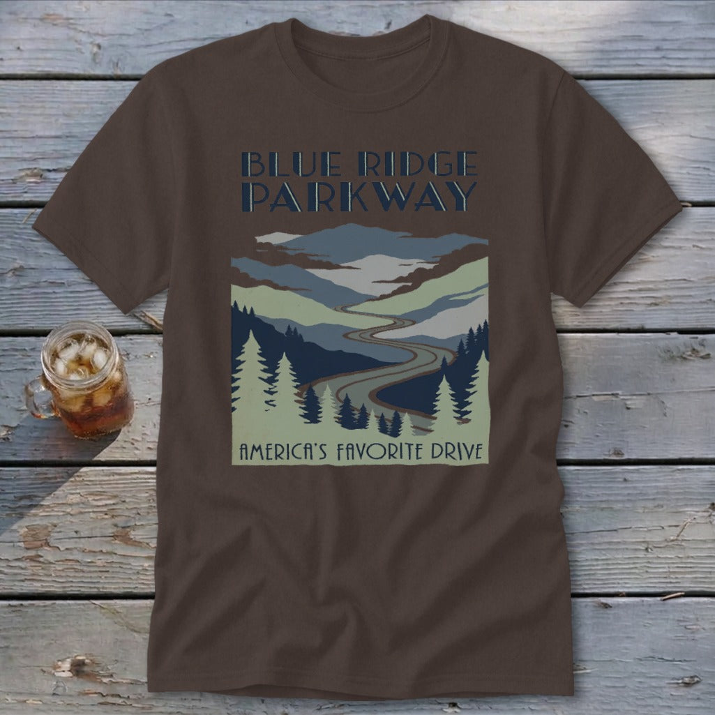 A brown t-shirt featuring Blue Ridge Parkway graphic art with mountains, trees, and a winding road.