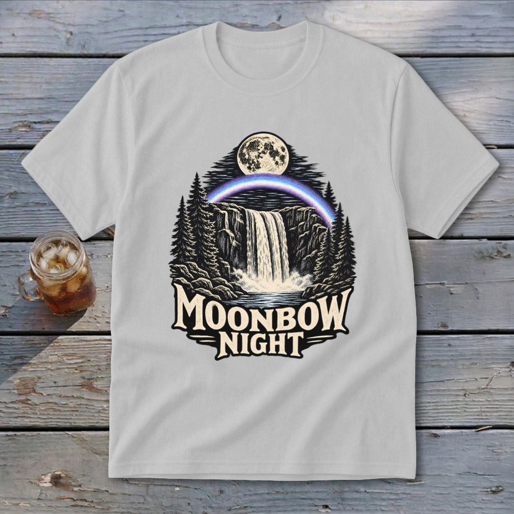 T-shirt graphic with waterfall, moon, rainbow, trees, and text "Moonbow Night".