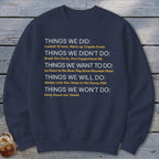 Navy sweatshirt with white and yellow text listing "Things We Did", "Didn't Do", "Want To Do", "Will Do", and "Won't Do".