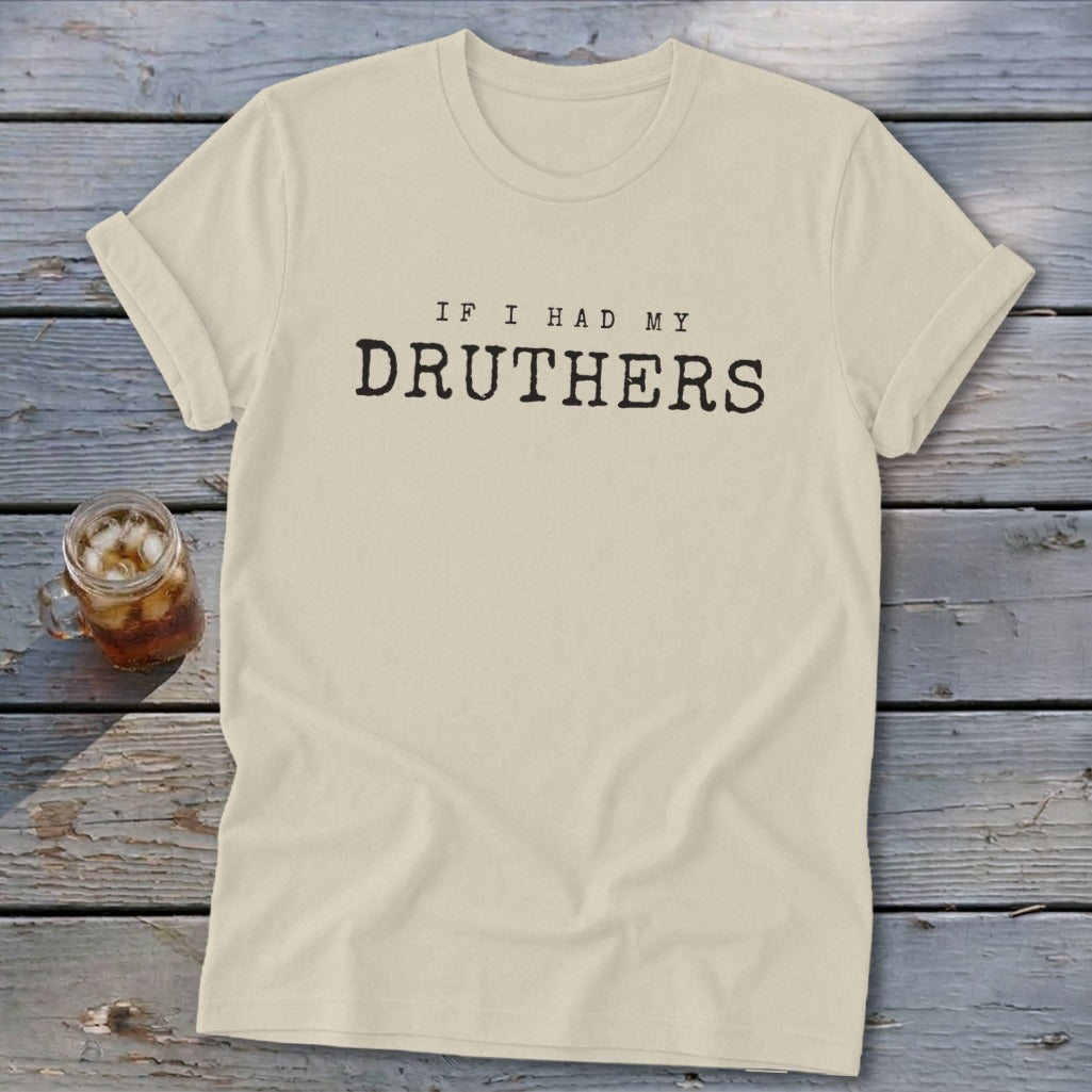 Cream t-shirt with text "IF I HAD MY DRUTHERS" in black, on a wooden background.