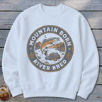 White sweatshirt with a circular graphic of a jumping trout and text "Mountain Born River Bred".