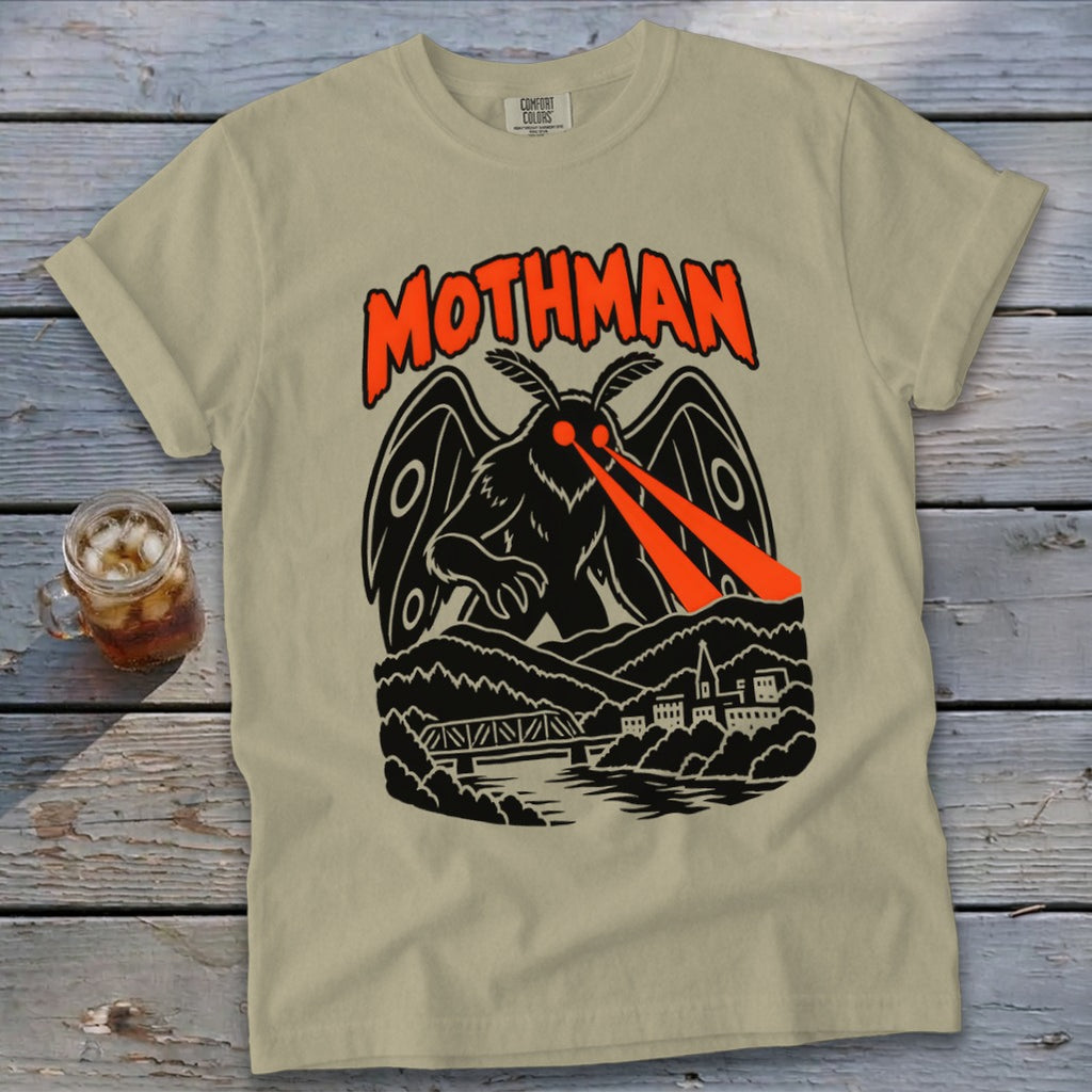 Mothman graphic t-shirt with a dark silhouette design and orange accents.