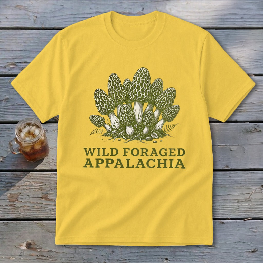 Yellow t-shirt with a graphic of morel mushrooms and text "WILD FORAGED APPALACHIA".