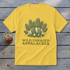 Yellow t-shirt with a graphic of morel mushrooms and text "WILD FORAGED APPALACHIA".