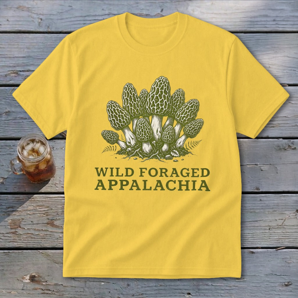 Yellow t-shirt with a graphic of morel mushrooms and text "WILD FORAGED APPALACHIA".