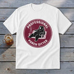 A white t-shirt featuring a circular maroon logo with a bear relaxing on a porch swing and the text PROFESSIONAL PORCH SITTER.