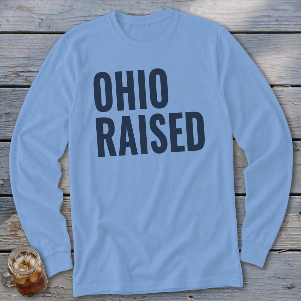 Light blue long sleeve shirt with "OHIO RAISED" printed in dark blue.
