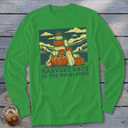Green long-sleeve t-shirt featuring a graphic of stacked pumpkins, hills, and the text Harvest Days in the Highlands.