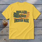 Yellow t-shirt with distressed American flag and text "HOLER RAISED AMERICAN MADE".