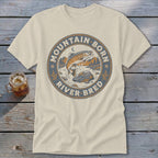 Light beige t-shirt with circular graphic of jumping trout and text "Mountain Born River Bred".