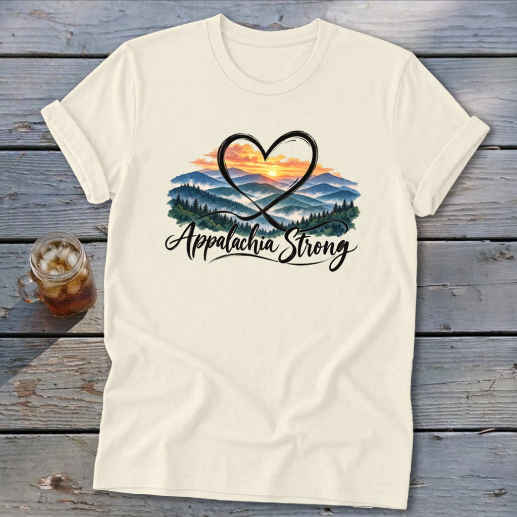Cream t-shirt with "Appalachia Strong" text and a heart framing a mountain sunrise.