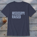 Navy V-neck t-shirt with "MISSISSIPPI RAISED" text.