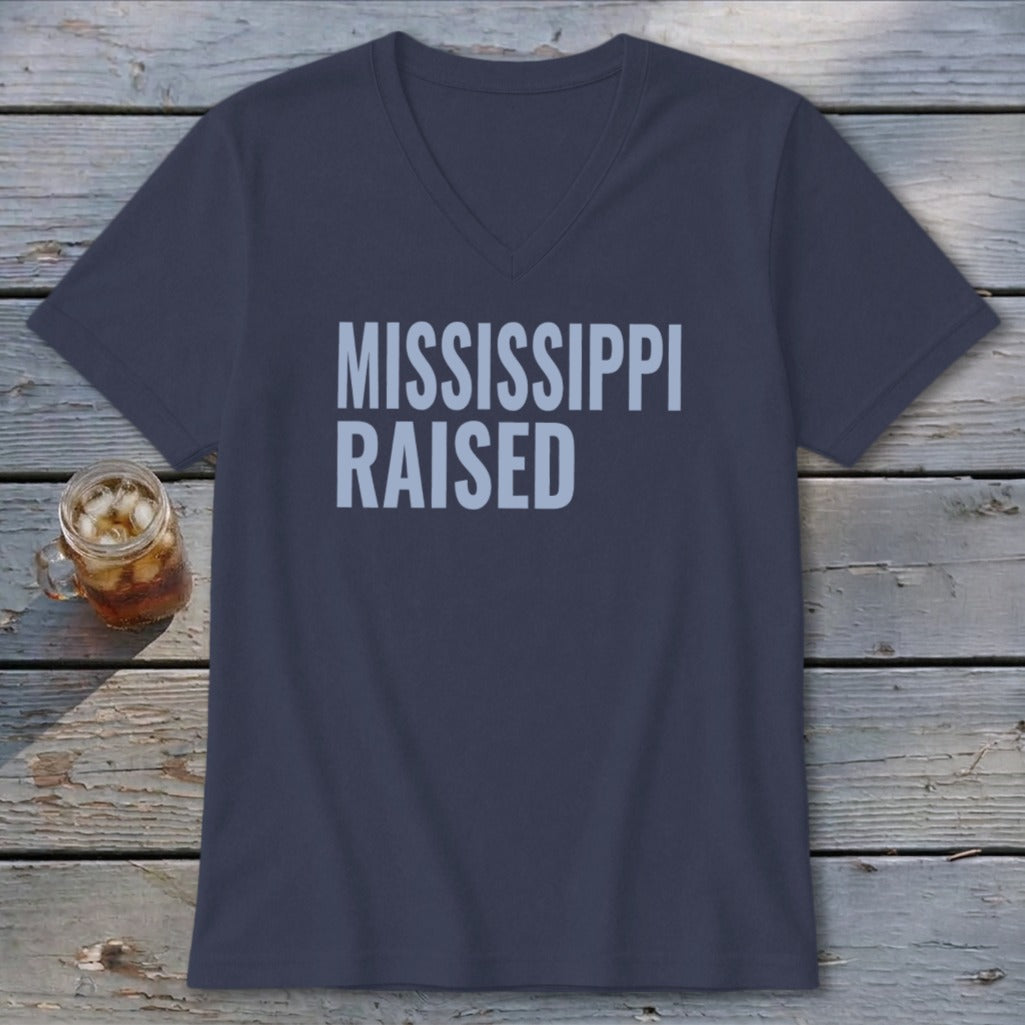 Navy V-neck t-shirt with "MISSISSIPPI RAISED" text.